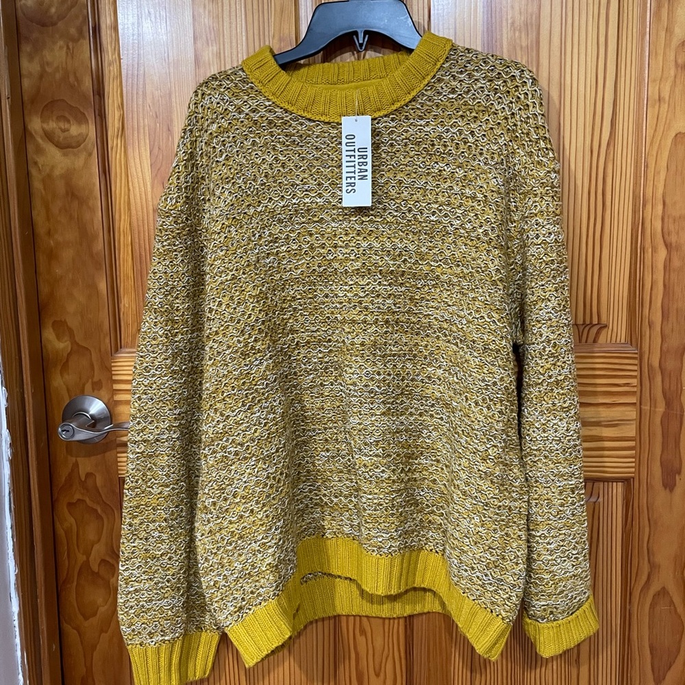 Large cable knit sweater